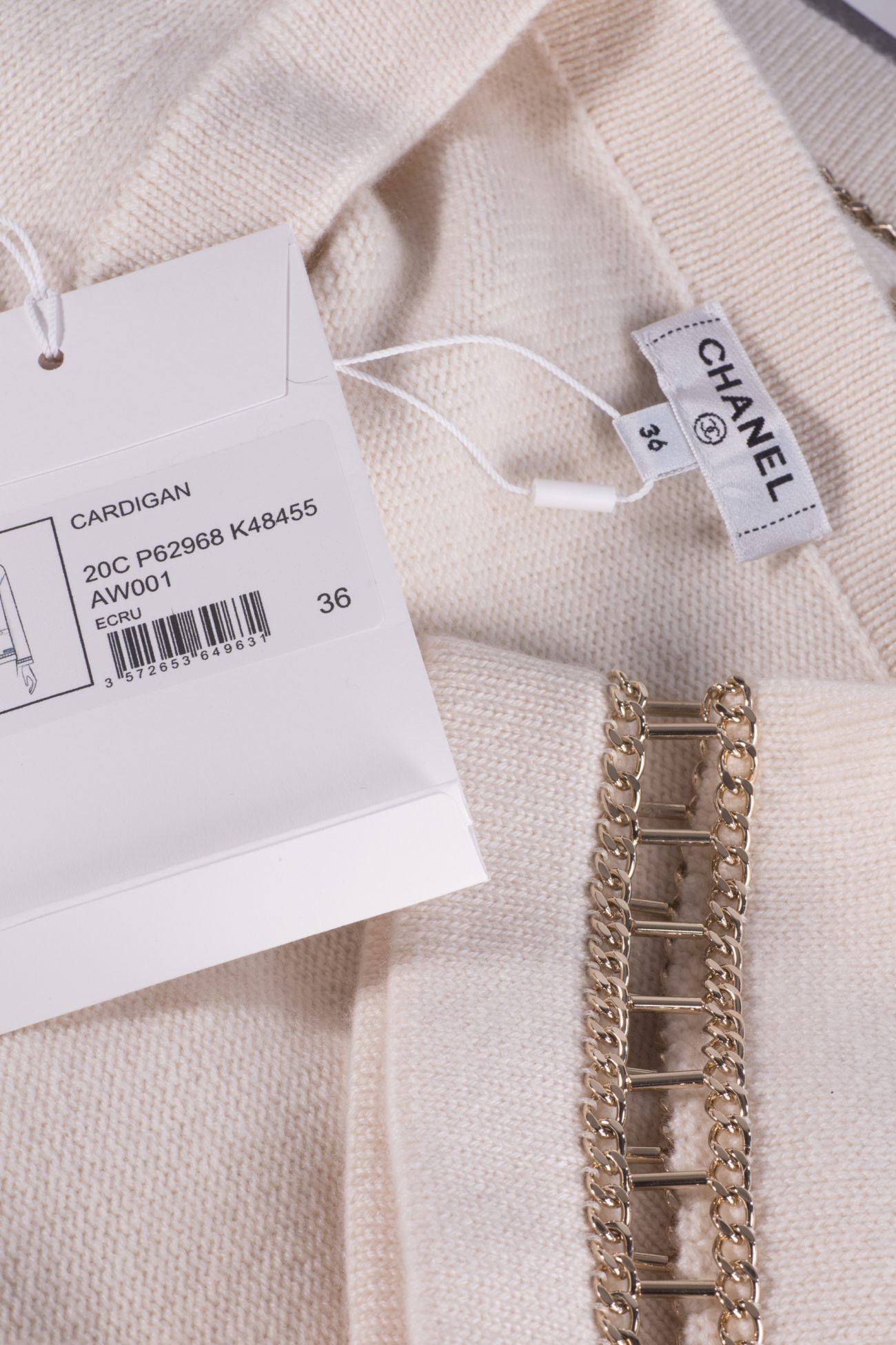 Chanel Cashmere cardigan with decorative chain