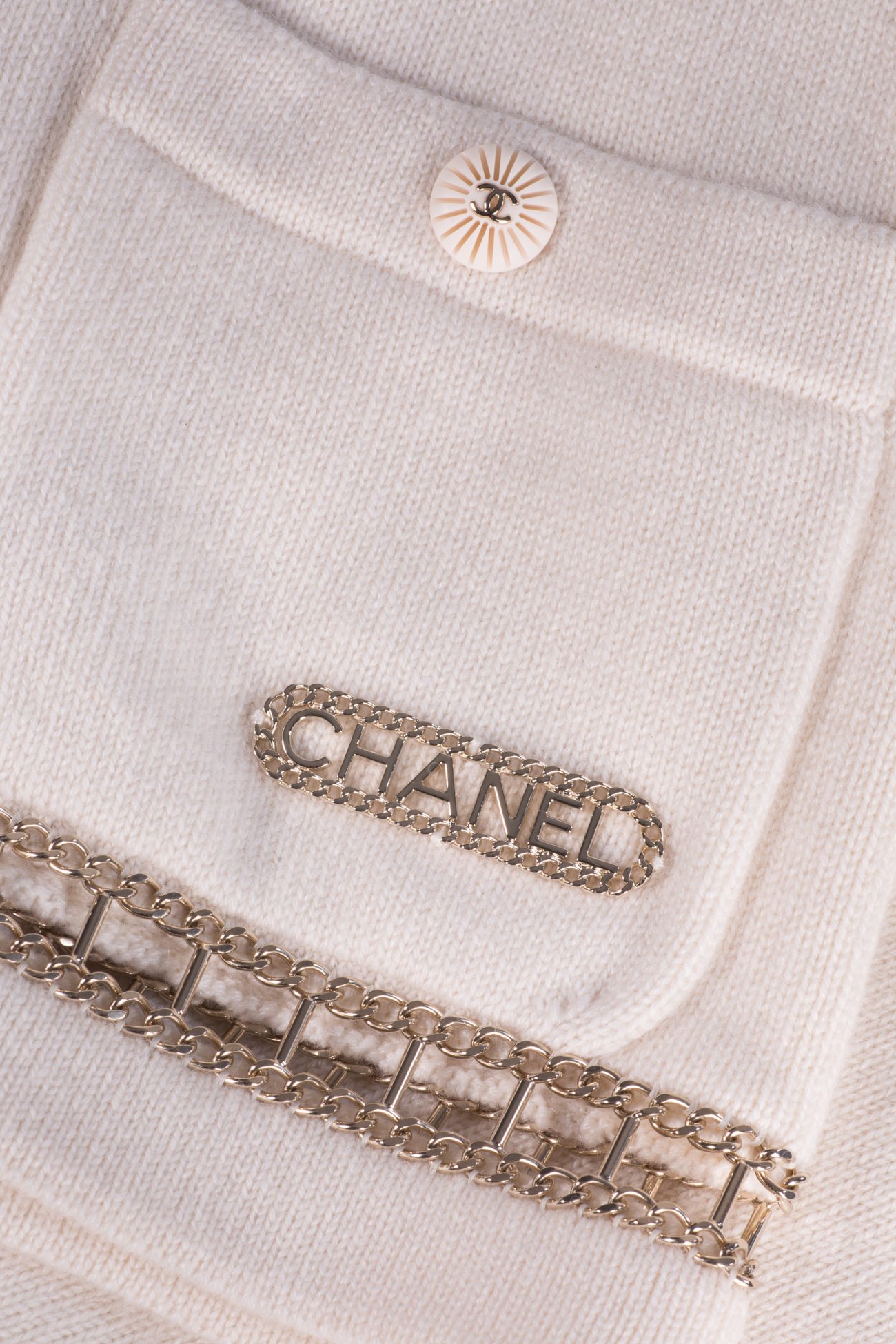Chanel Cashmere cardigan with decorative chain