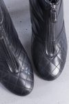 Chanel Black quilted leather front zip ankle boots