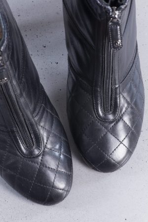 Chanel Black quilted leather front zip ankle boots