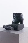 Chanel Black quilted leather front zip ankle boots