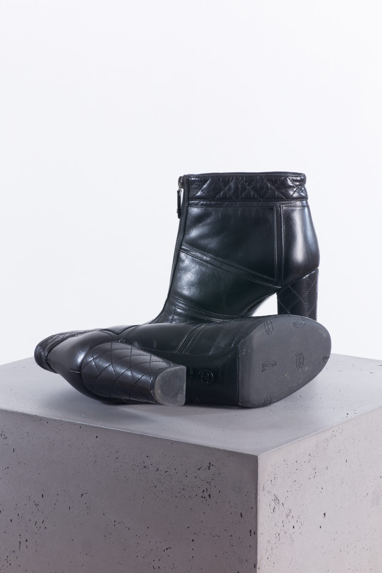 Chanel Black quilted leather front zip ankle boots
