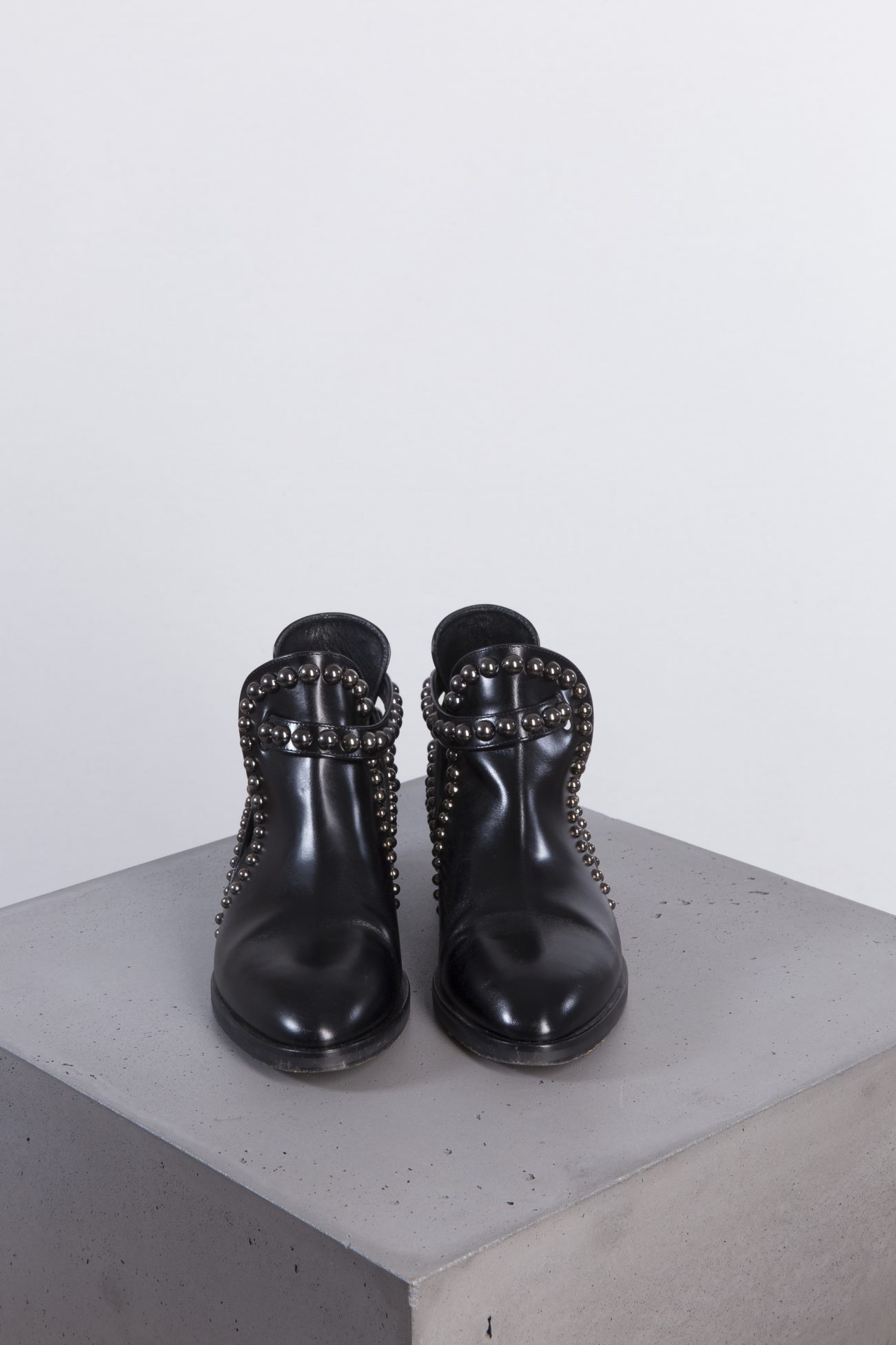 Alaia Eyelet-embellished cutout leather ankle boots