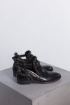 Alaia Eyelet-embellished cutout leather ankle boots