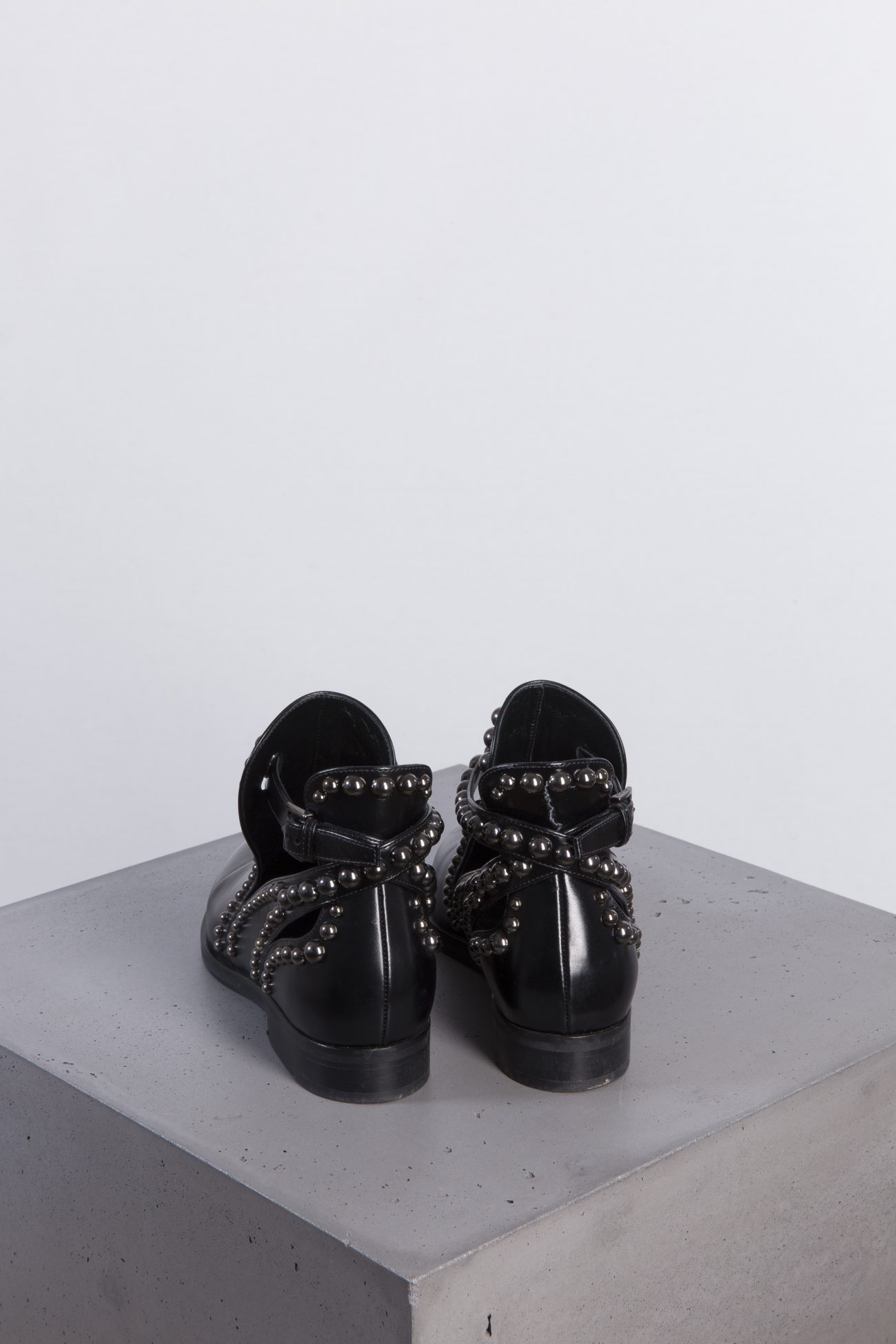 Alaia Eyelet-embellished cutout leather ankle boots