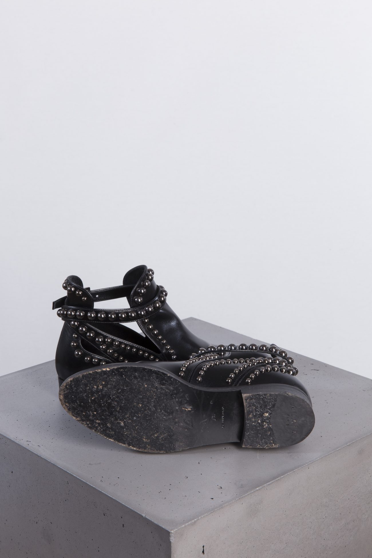 Alaia Eyelet-embellished cutout leather ankle boots