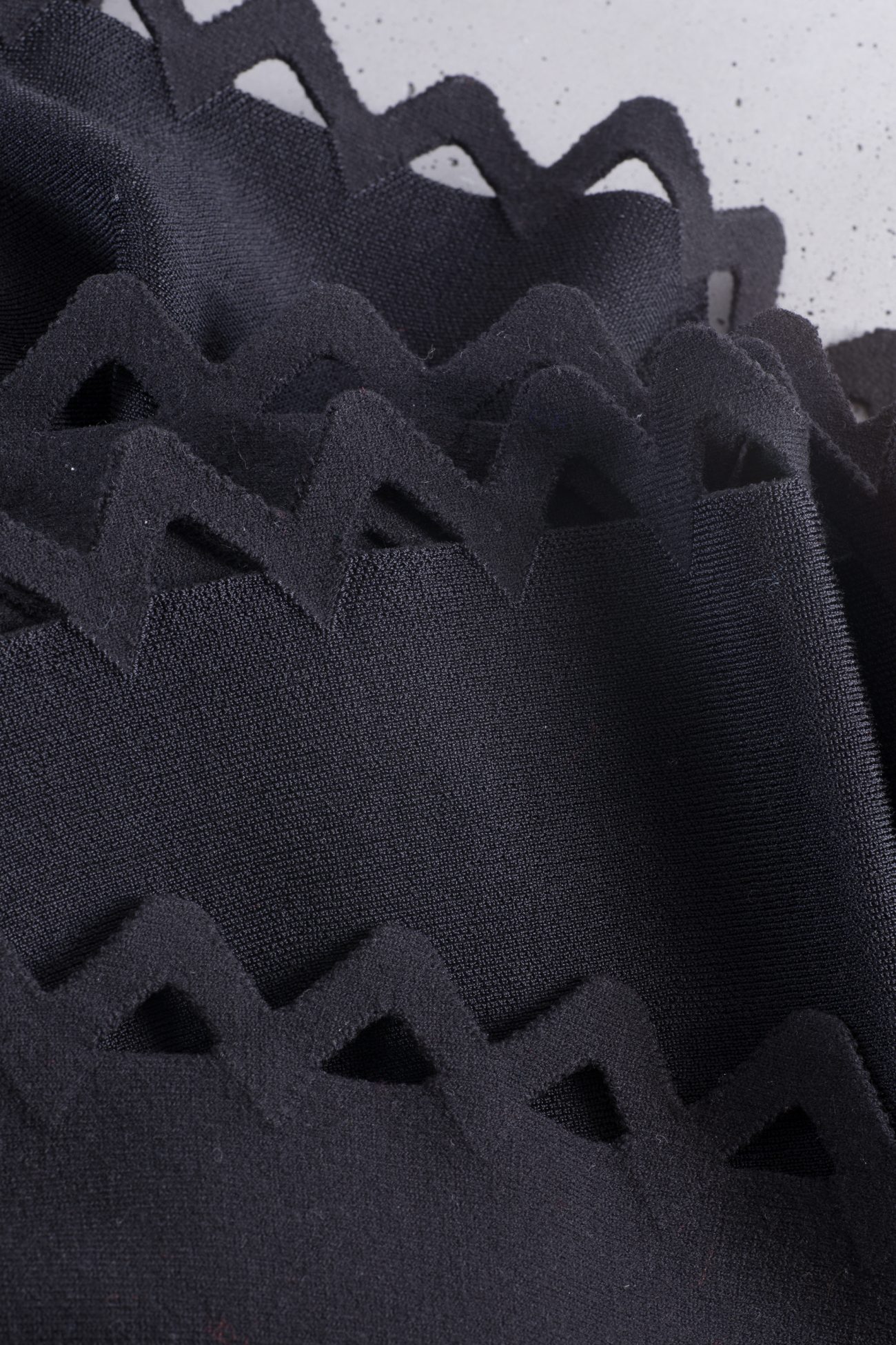Alaia Laser-cut stretch-knit mini dress