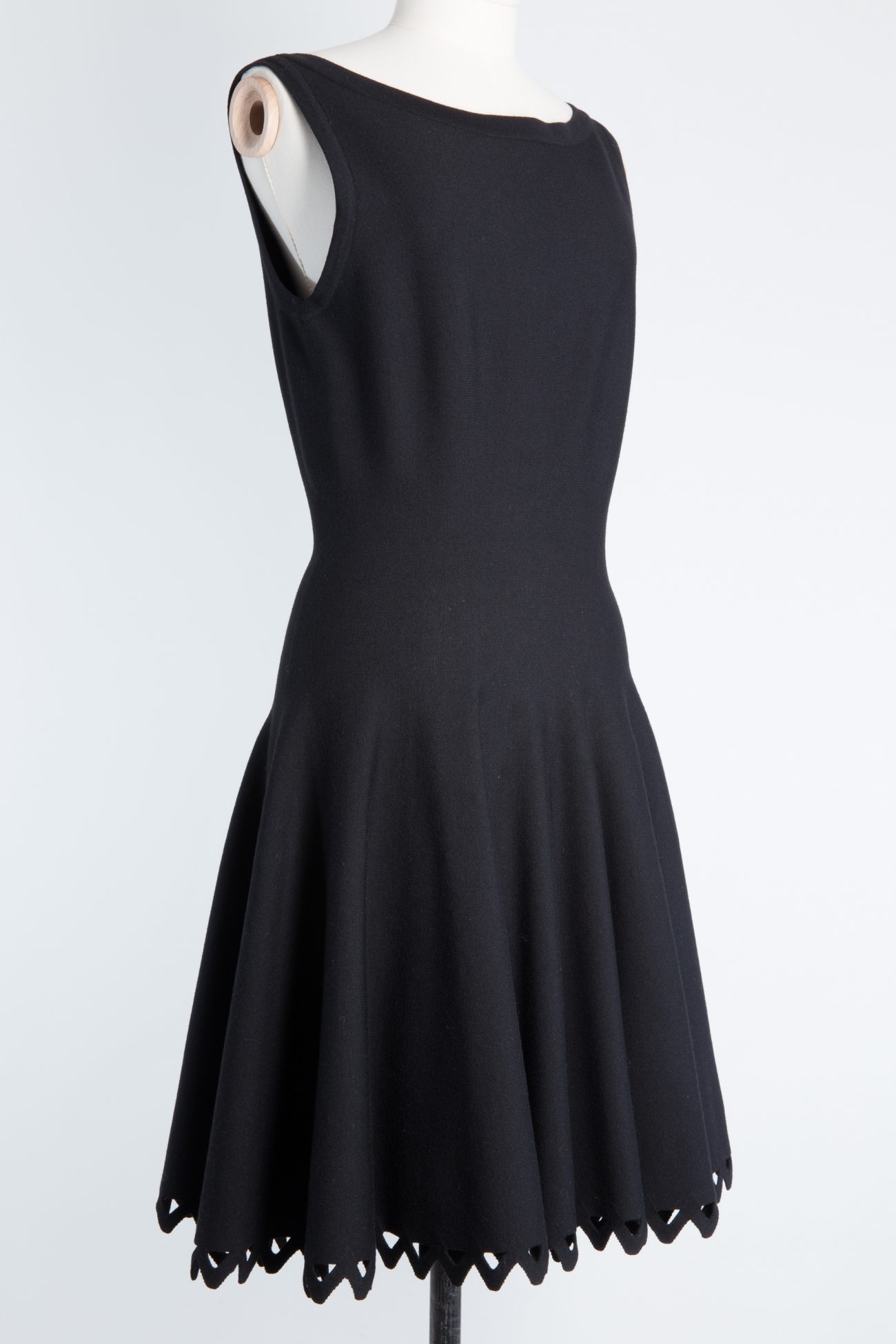 Alaia Laser-cut stretch-knit mini dress