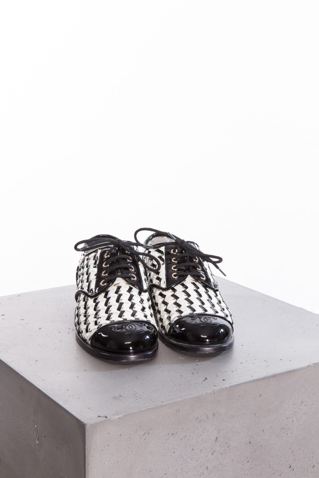 Chanel Braided in black and white patent leather loafers