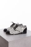 Chanel Braided in black and white patent leather loafers