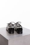 Chanel Braided in black and white patent leather loafers