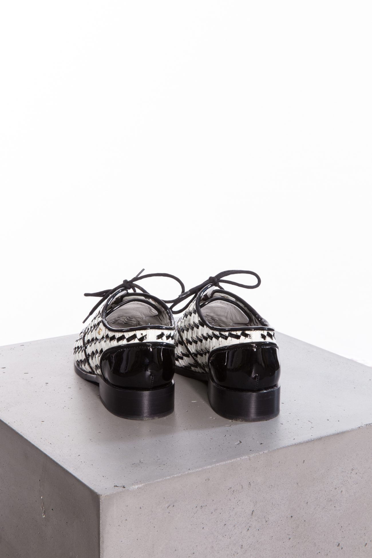 Chanel Braided in black and white patent leather loafers