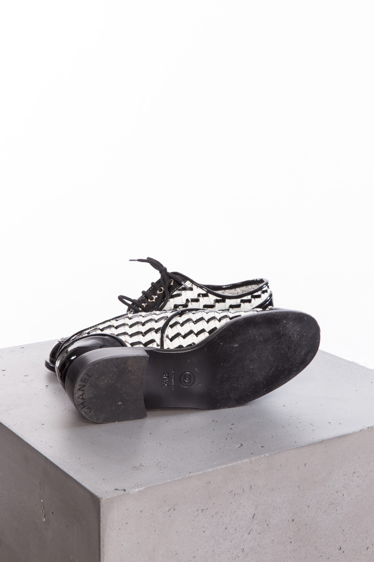 Chanel Braided in black and white patent leather loafers