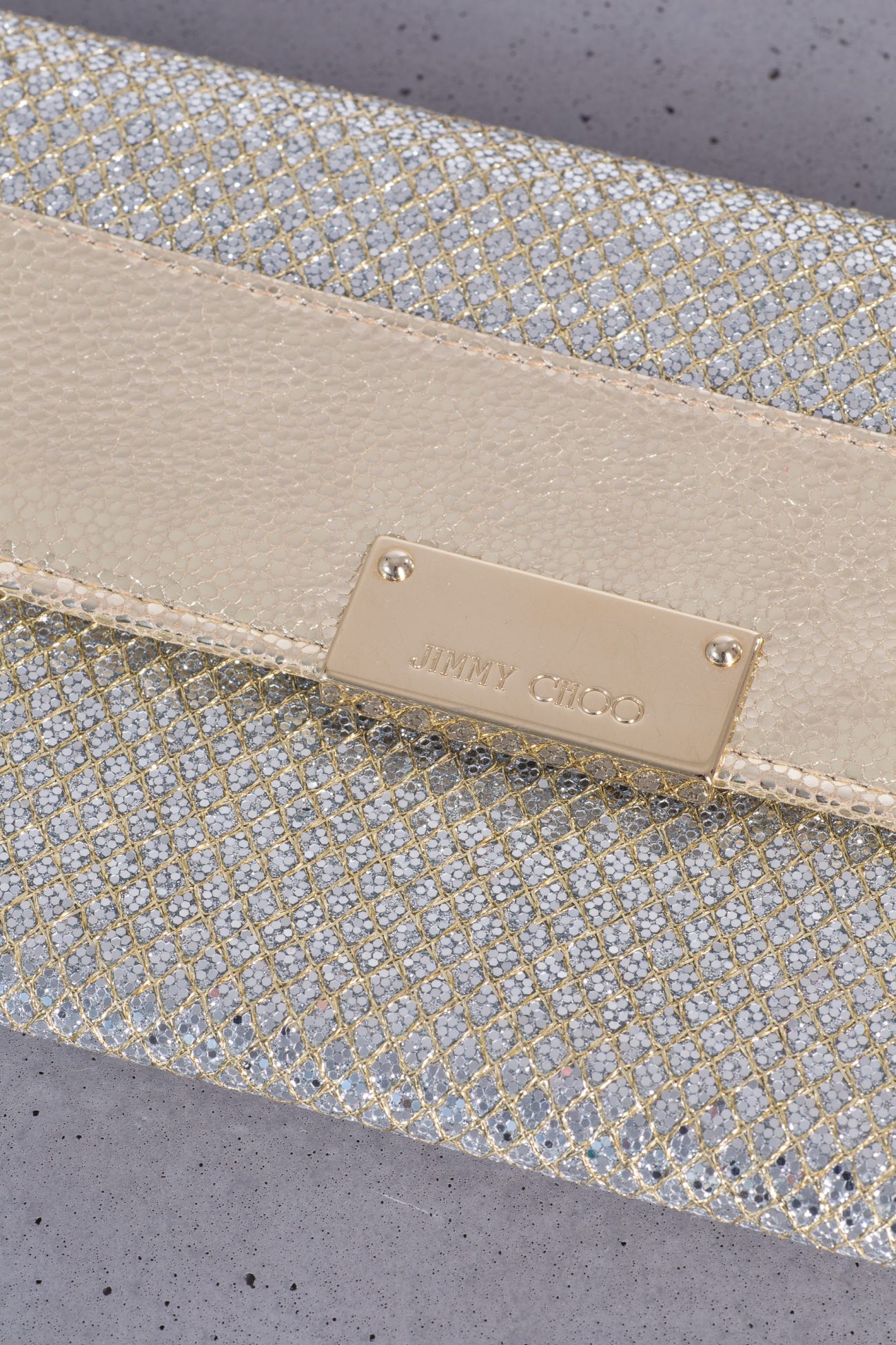 Jimmy Choo Gold and silver glitter leather clutch bag