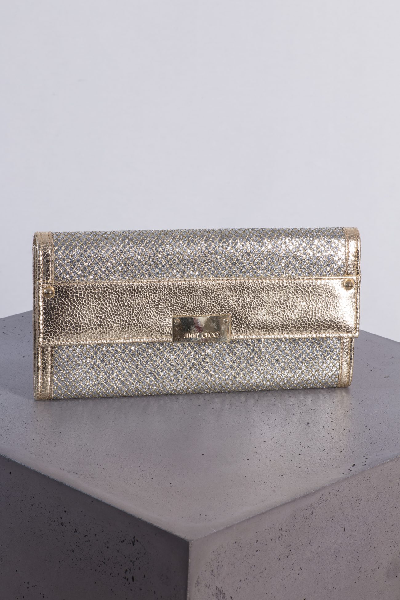 Jimmy Choo Gold and silver glitter leather clutch bag