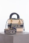 Christian Dior Medium Lady Dior natural rattan and blue Dior oblique jacquard bag
