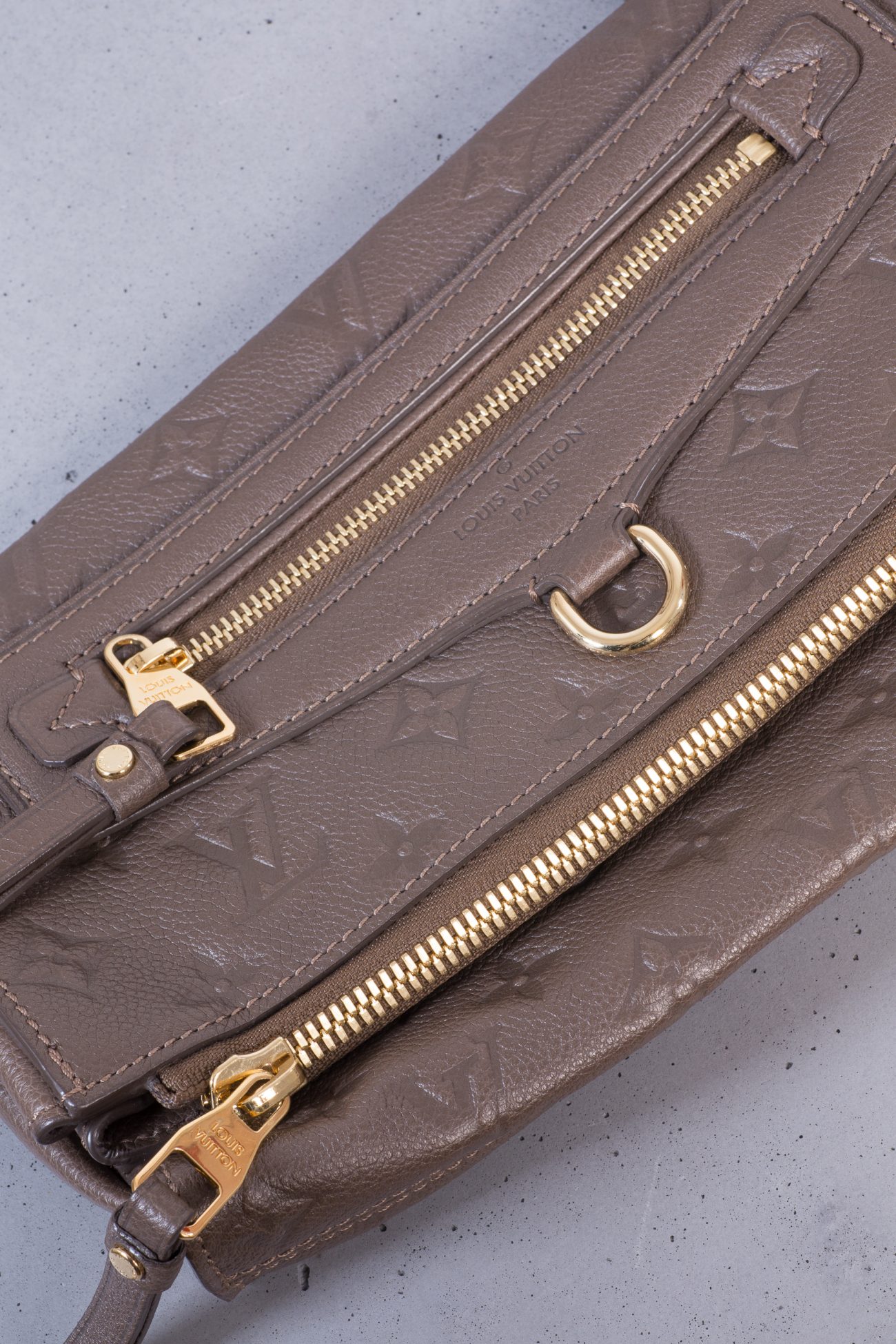 Louis Vuitton Petillante Monogram Empreinte fold-over clutch bag in taupe