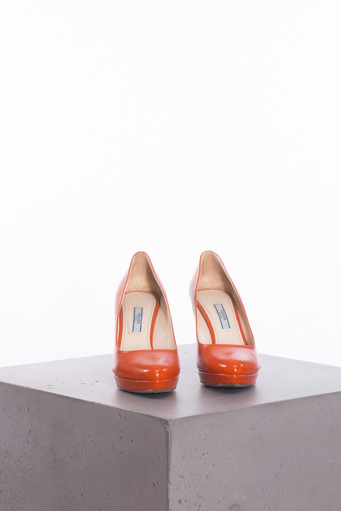 Prada Brick red patent leather rounded toe pumps