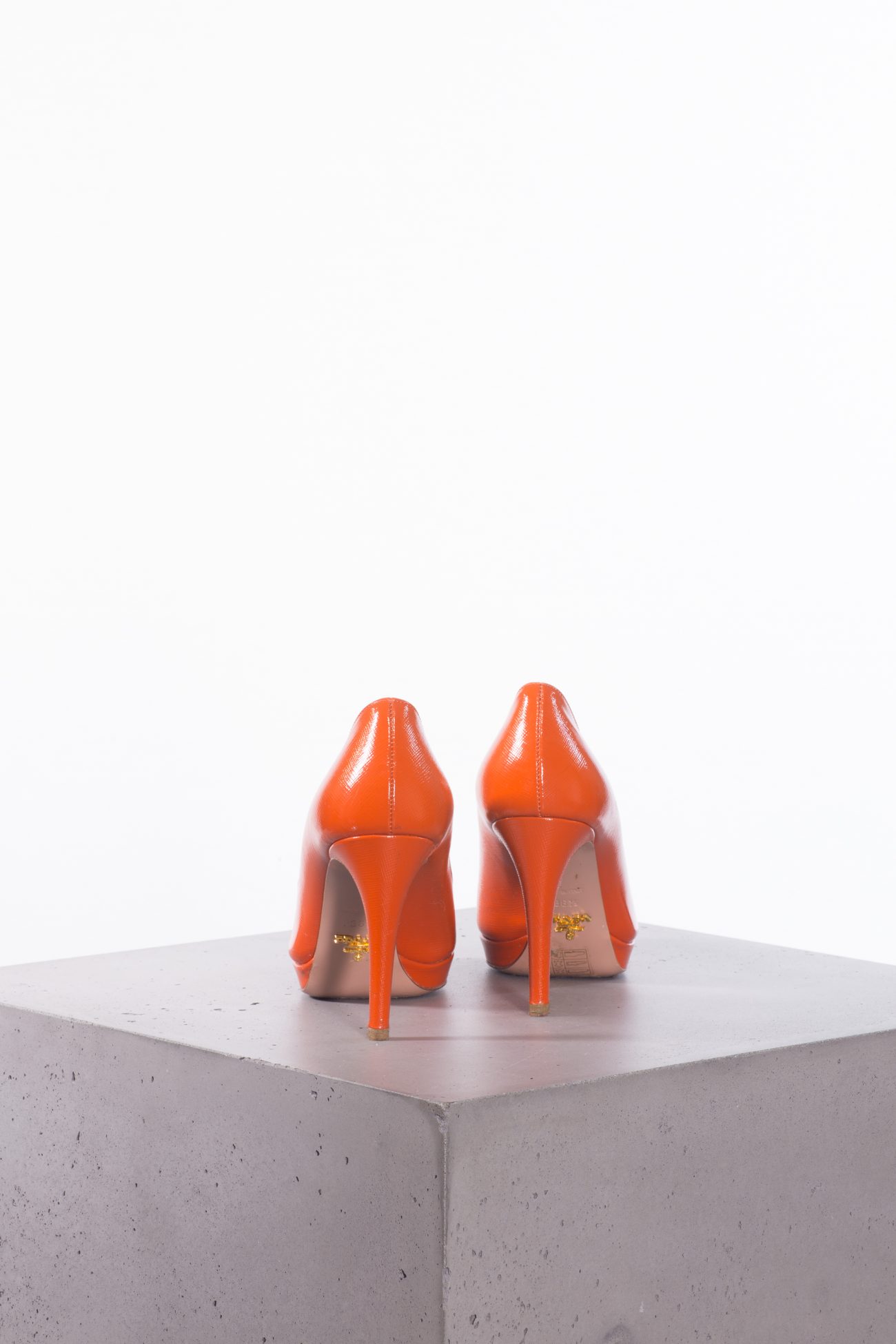 Prada Brick red patent leather rounded toe pumps