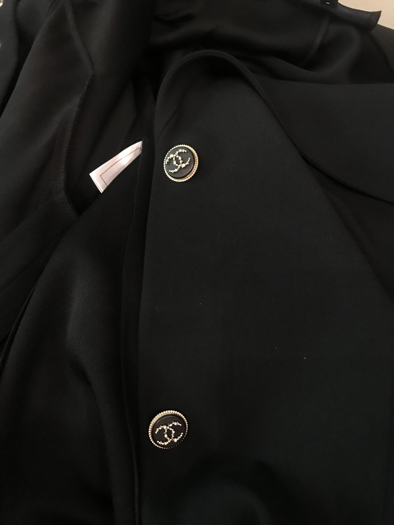 Chane lTimeless black coat-cardigan with iconic chain accents