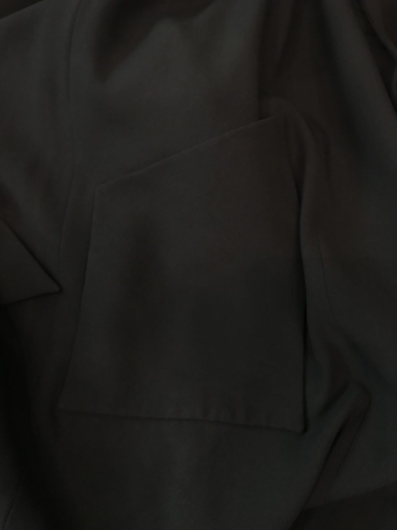Chane lTimeless black coat-cardigan with iconic chain accents