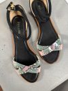 Pollini Leather & suede sandals with snakeskin print