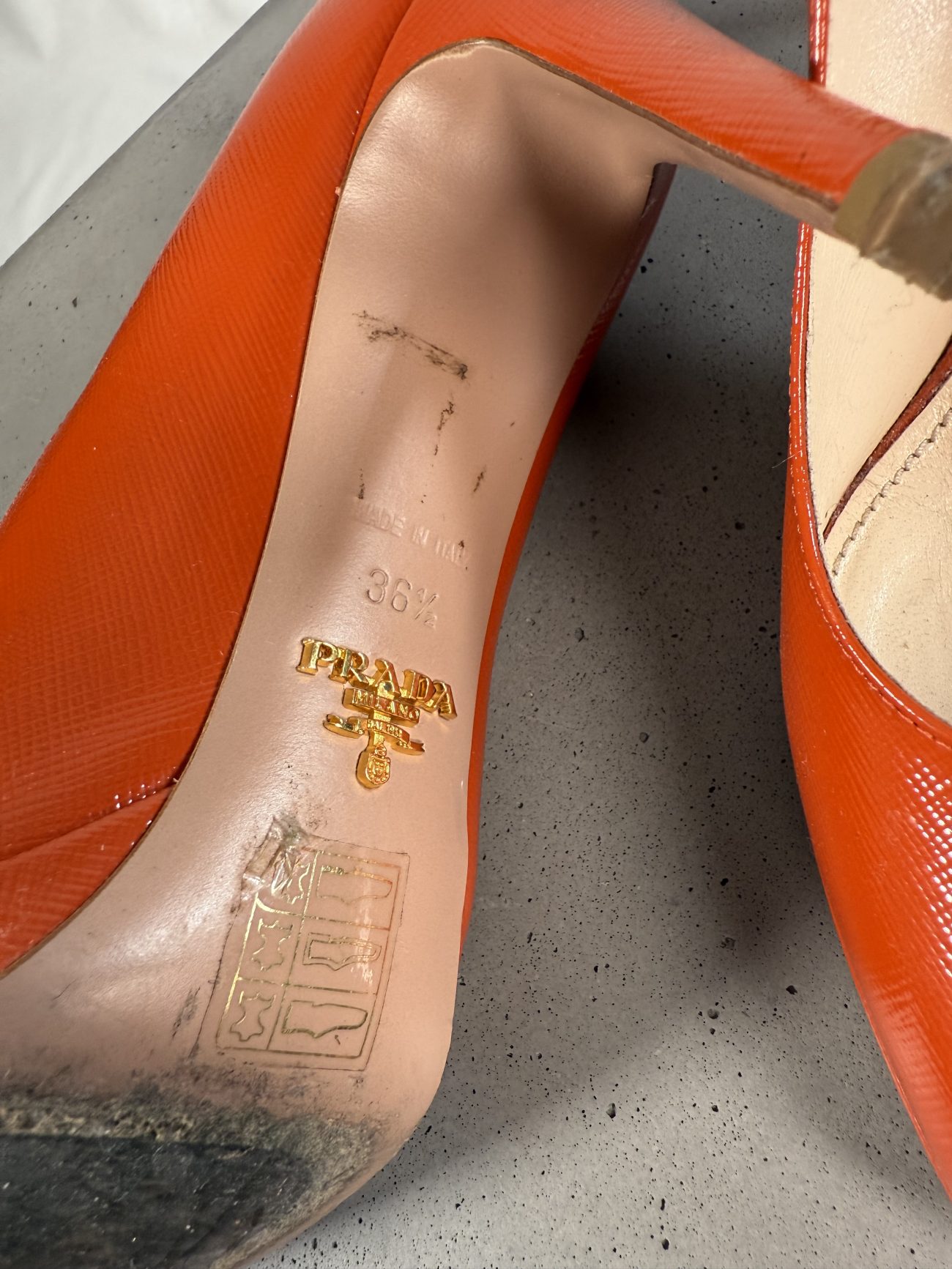 Prada Brick red patent leather rounded toe pumps