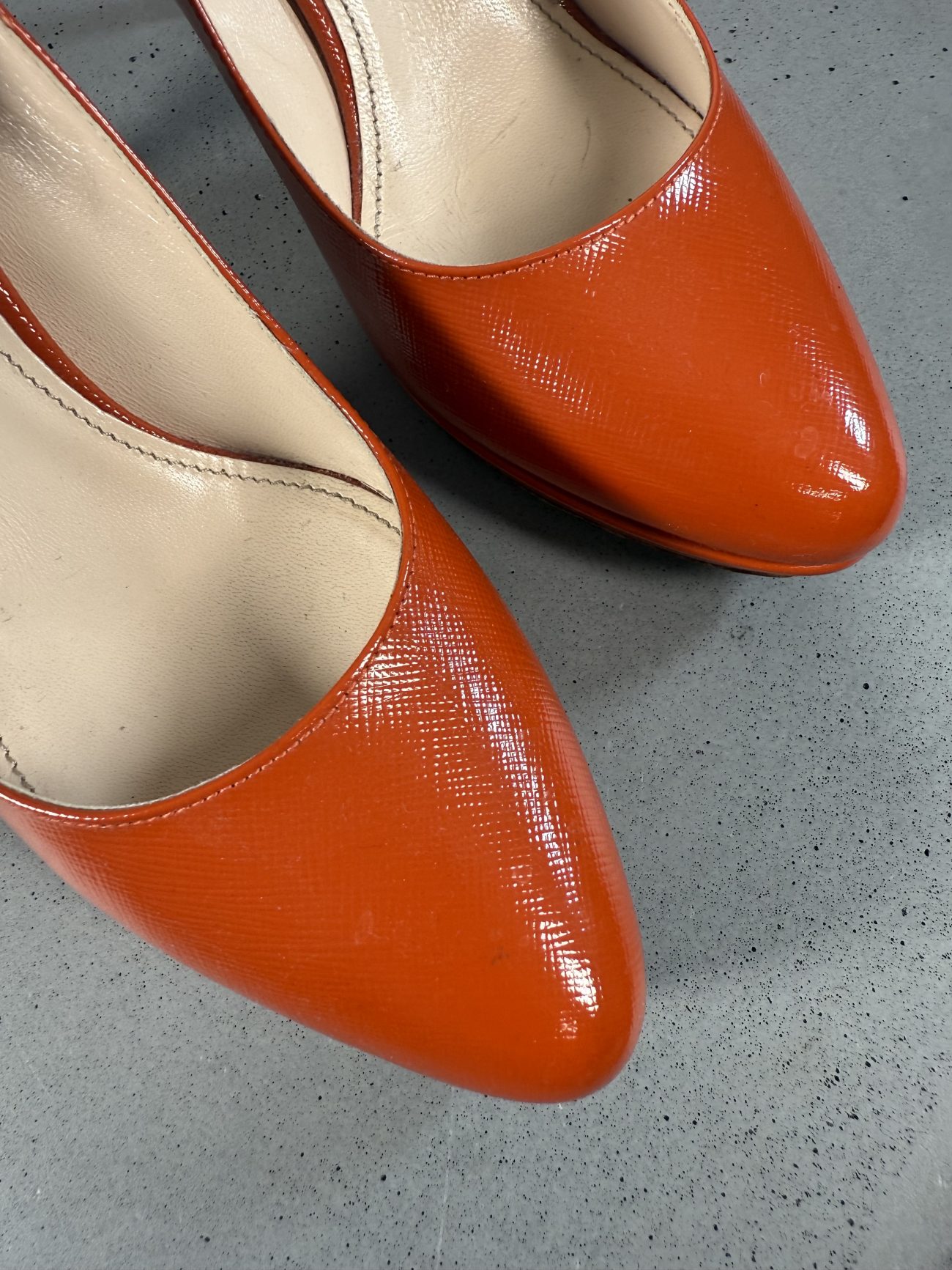 Prada Brick red patent leather rounded toe pumps
