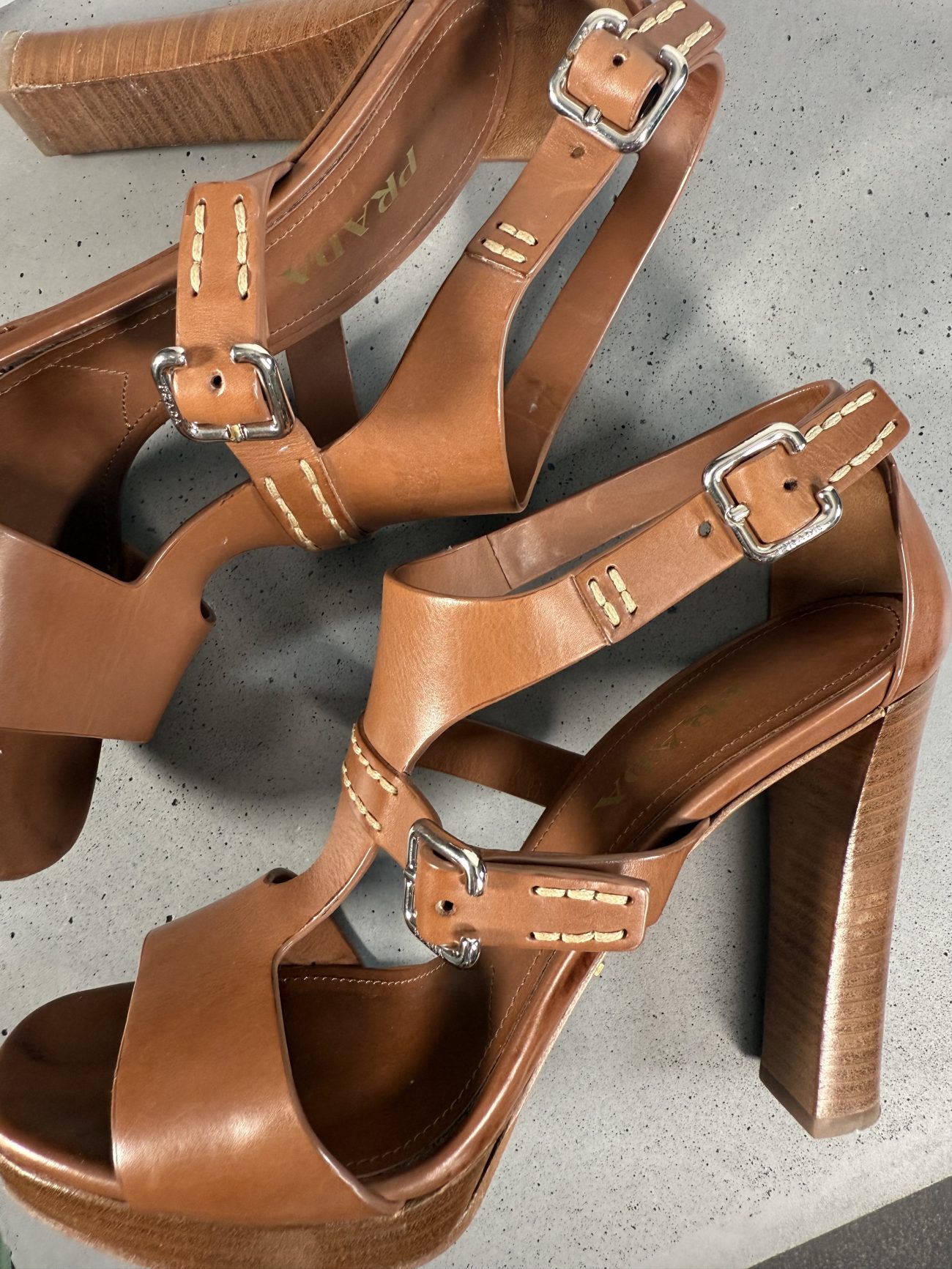 Prada Leather T-strap sandals in camel