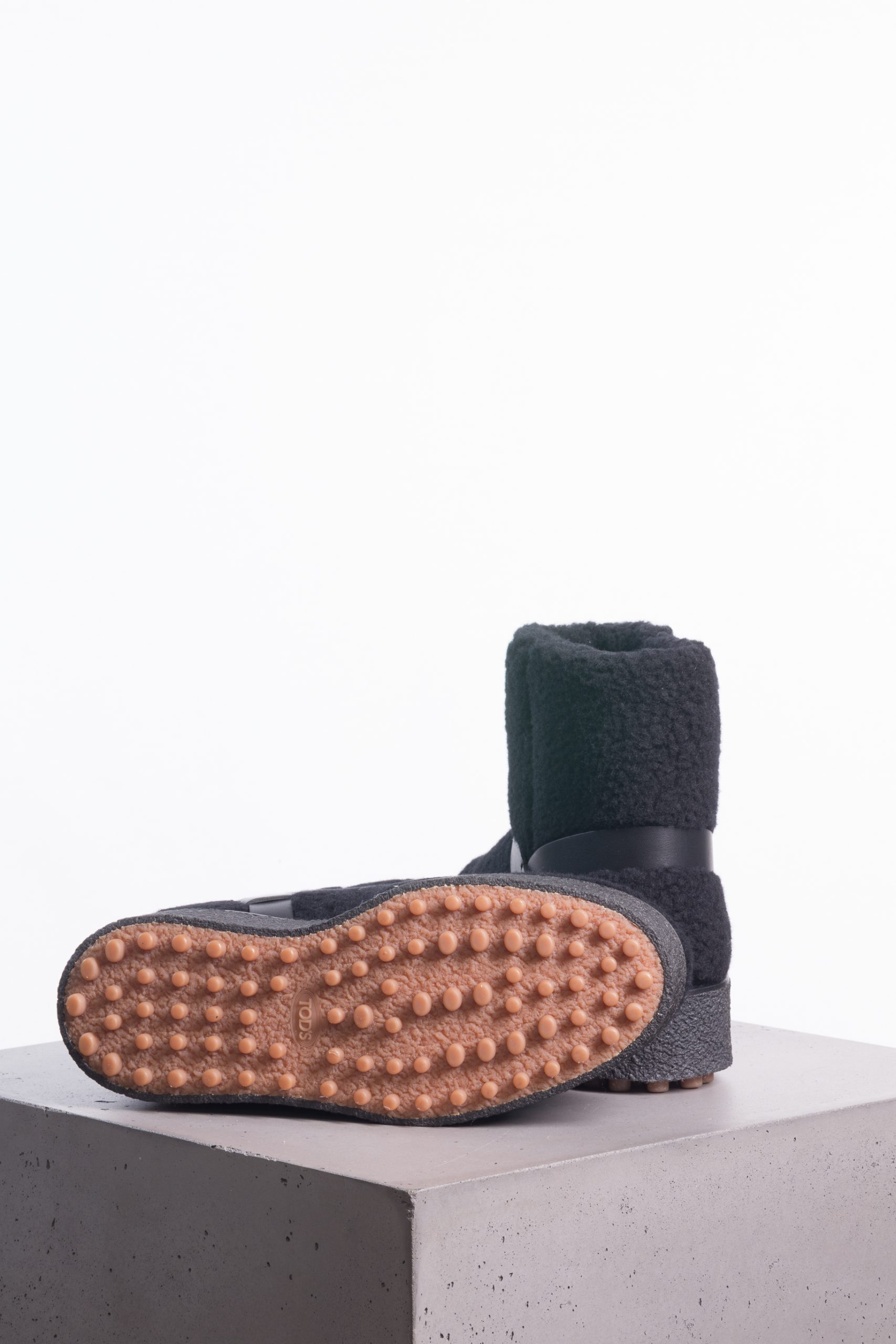 Tod’s Shearling Ankle Boots with Gold-Tone Buckle